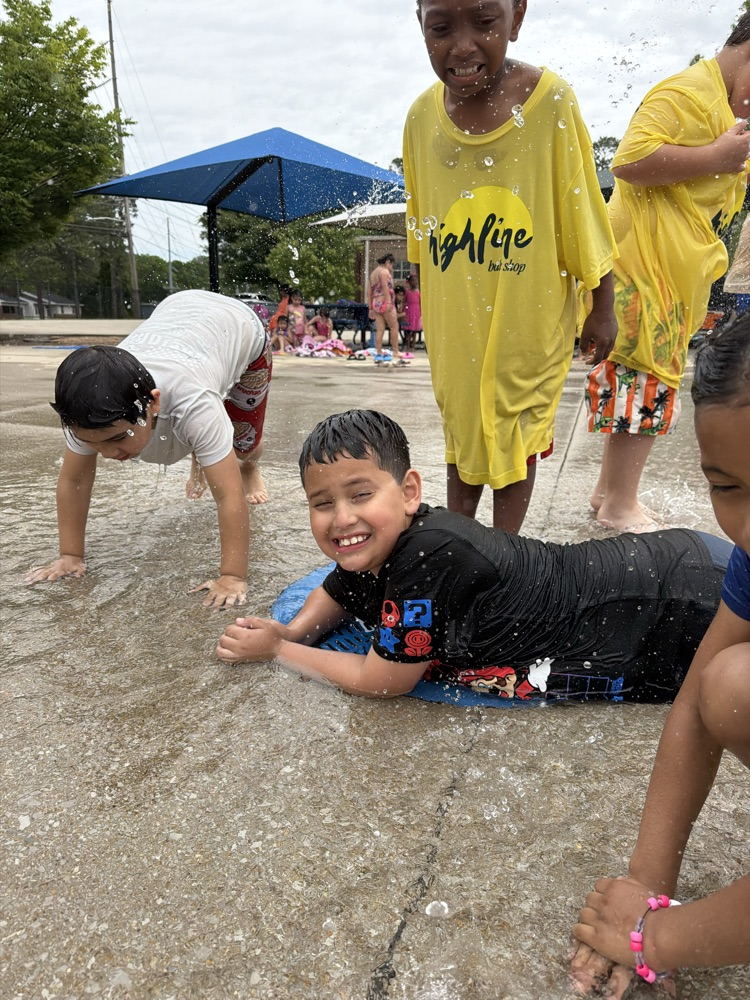 students at splash pad 