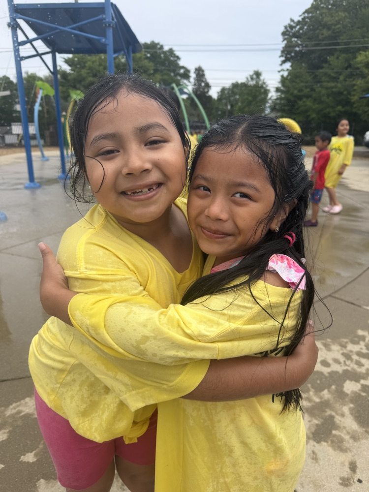 students at splash pad 