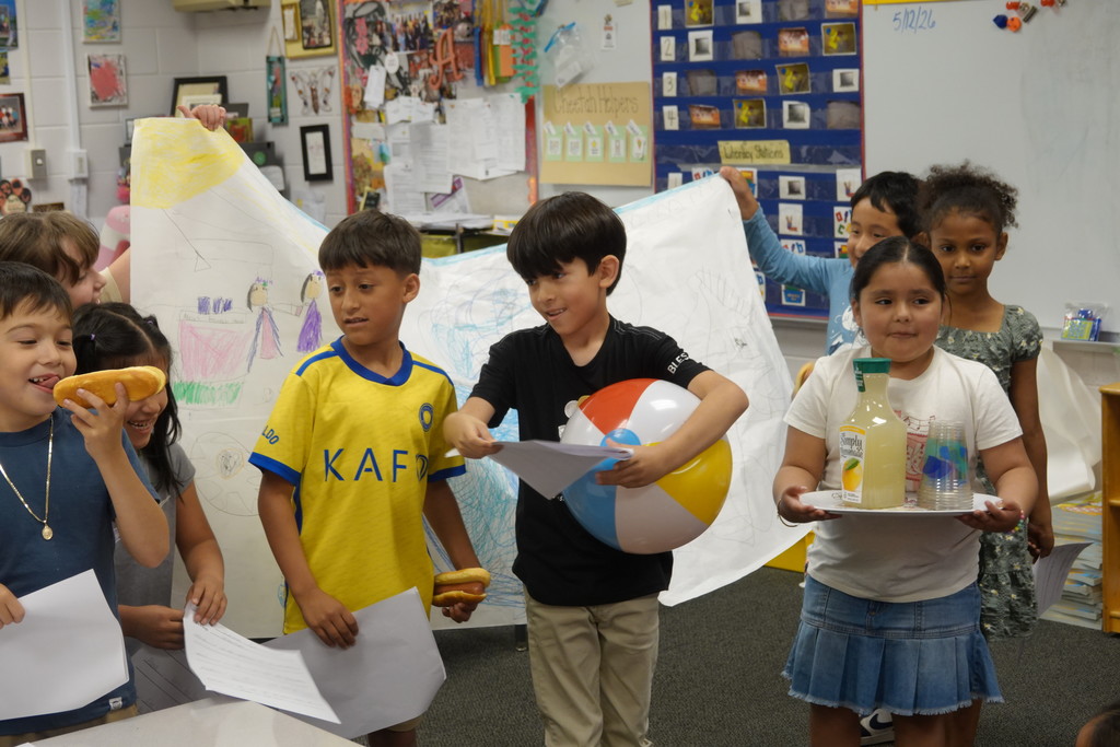 Mrs. Mueller's class presented seasons skits to a kindergarten class
