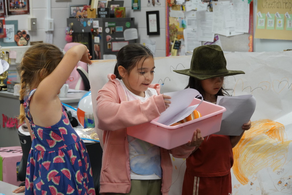 Mrs. Mueller's class presented seasons skits to a kindergarten class