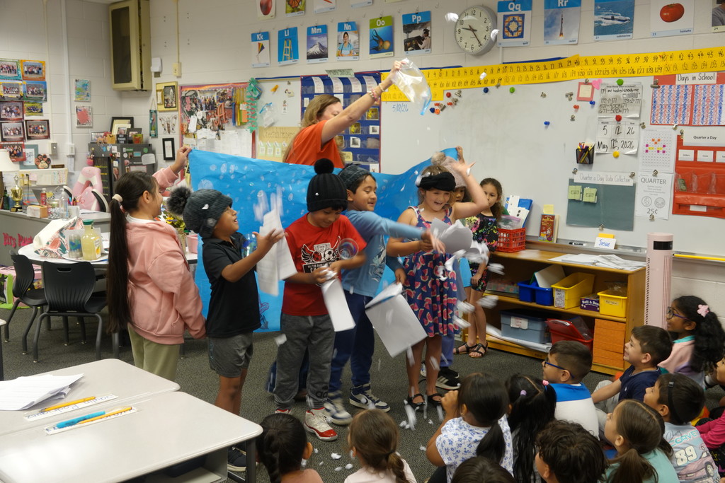Mrs. Mueller's class presented seasons skits to a kindergarten class