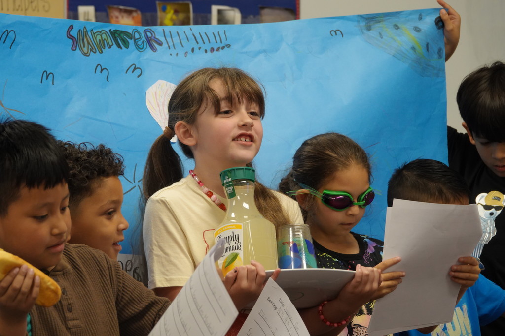 Mrs. Mueller's class presented seasons skits to a kindergarten class