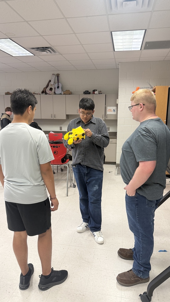 students testing a balloon car