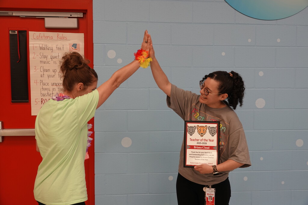 teacher and support staff of the year with awards