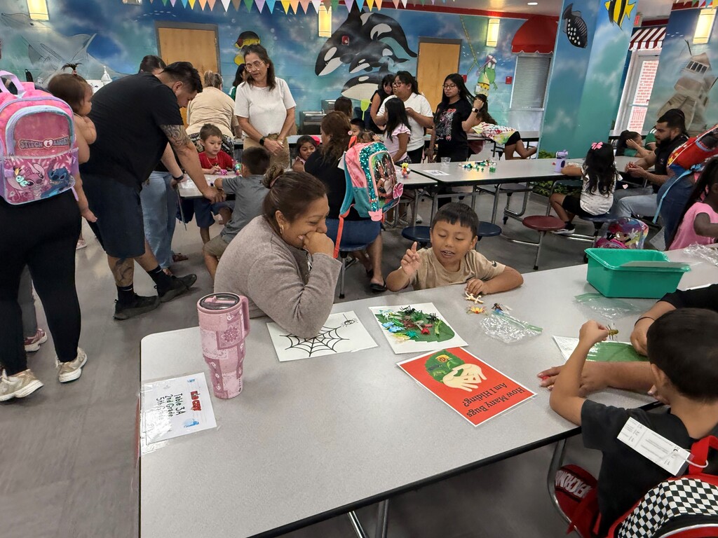 On Tuesday, June 16, the Rising Pre-K and Kindergarten Summer Transition Program hosted its first annual Magical Math Family Workshop, inviting students and families to explore the joy of numeracy through hands-on learning stations.  This year’s theme, “A Bug’s Life,” brought together the excitement of math and science as students worked through six engaging stations that combined counting, problem-solving, and insect-themed fun! From plastic spiders and web mats to fly swatters and dice games, every activity was designed to spark curiosity and build foundational math skills in a playful, memorable way.  Families rotated through stations including:  Roll, Find, and Stamp – practicing number recognition and fine motor skills Race to Fill – counting and comparing using dice, cups, and pom-poms How Many Bugs Am I Hiding? – building estimation and early addition skills Subitizing Cups – recognizing quantities quickly using dot stickers and patterns Smack the Bug Counting Game – developing number fluency with a fun twist Collecting Bugs – exploring preschool-level addition with bugs and butterflies It was a fantastic afternoon of math, movement, and memory-making for our young learners and their families