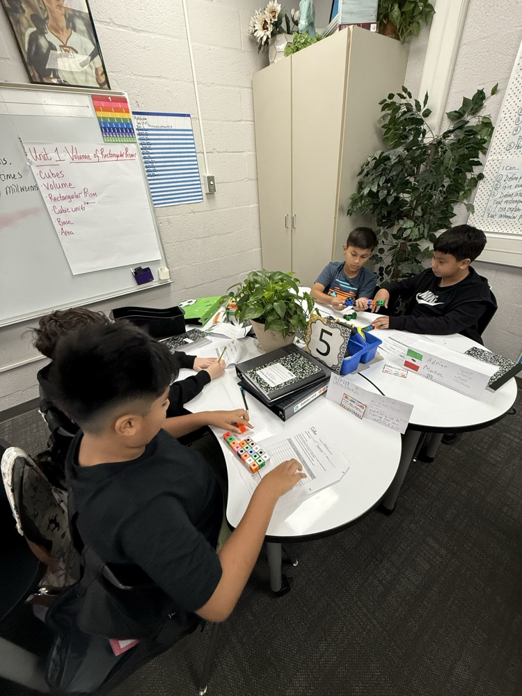 students in classroom working together 