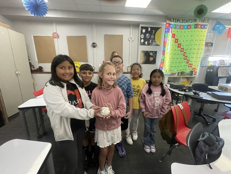 students completing the egg drop challenge together 