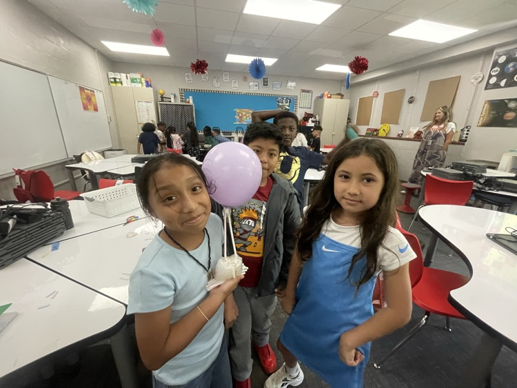 students completing the egg drop challenge together 