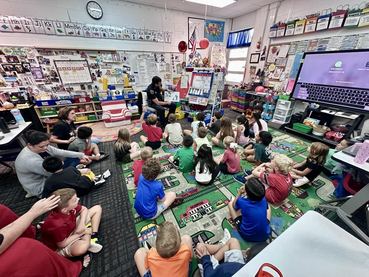Officer Jenkins reading to Mrs. Chitwood’s and Mrs. Santiago’s classes 