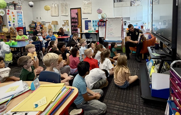 Officer Johnson reading to Mrs. Anderson’s and Mrs. Elrod’s classrooms