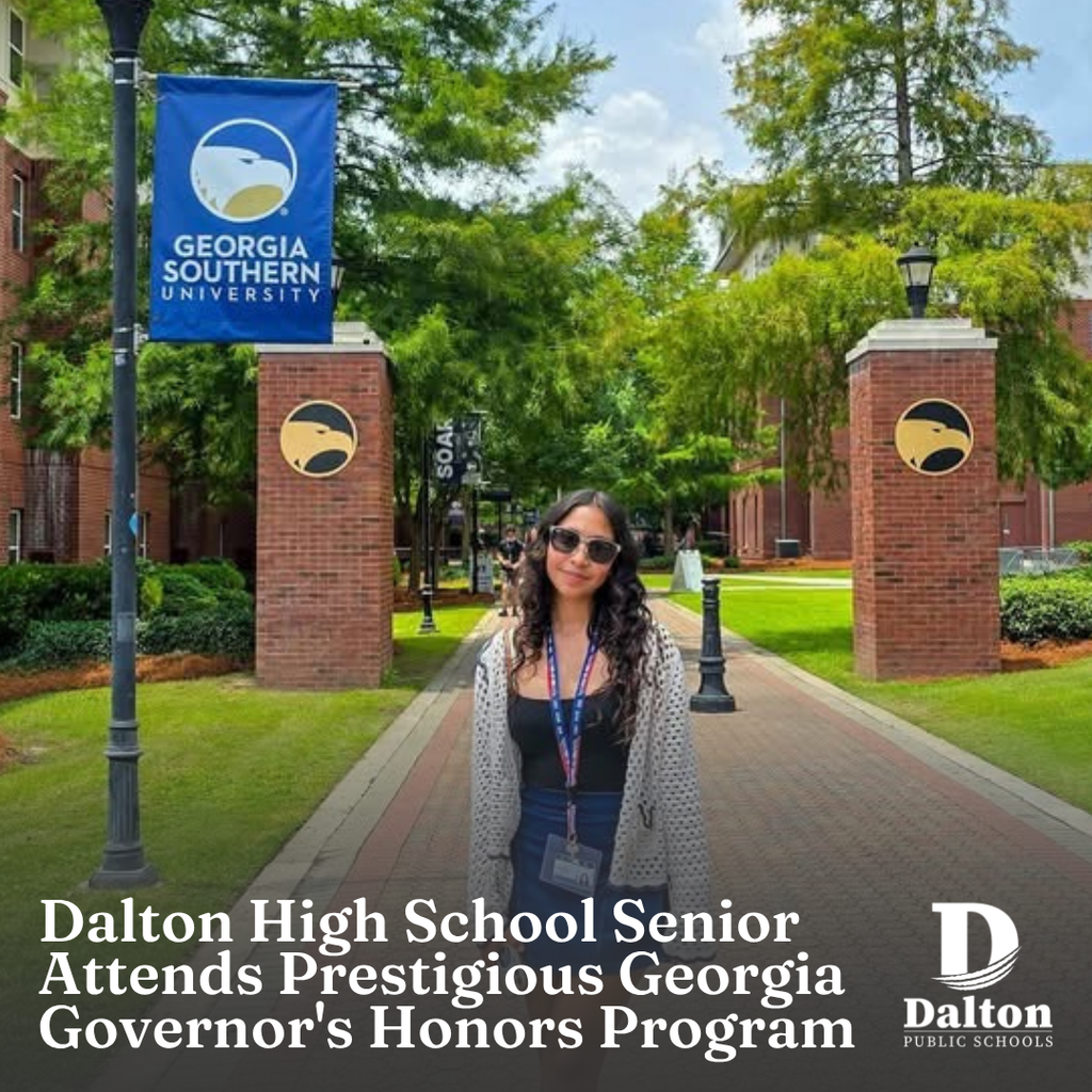 A news announcement graphic titled "Dalton High School Senior Attends Prestigious Georgia Governor's Honors Program" in bold white text at the bottom left, alongside the Dalton Public Schools logo at the bottom right. The background features a student wearing sunglasses, a black top, blue skirt, and a cream crocheted cardigan standing outdoors on a brick campus walkway. Behind her are brick entryway pillars with eagle medallions and a blue banner for "GEORGIA SOUTHERN UNIVERSITY".