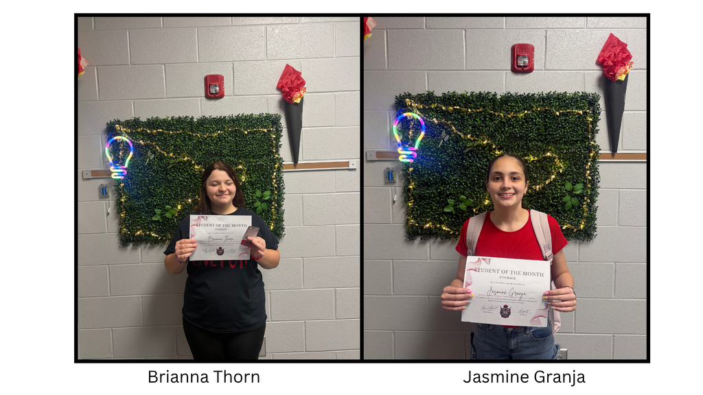 Brianna Thorn and Jasmine Granja holding a Spartan Student of the Month certificate. The student is being recognized by the 7th Grade 600 Hallway Spartans for demonstrating the character trait of courage.