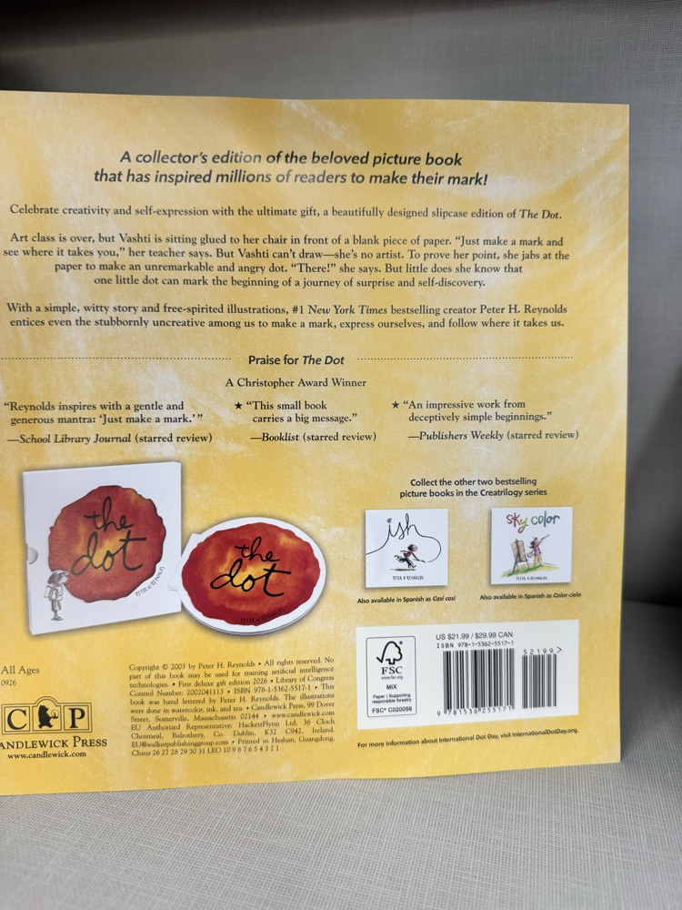 Close-up of the back of the yellow slipcase for the collector’s edition of The Dot by Peter H. Reynolds.