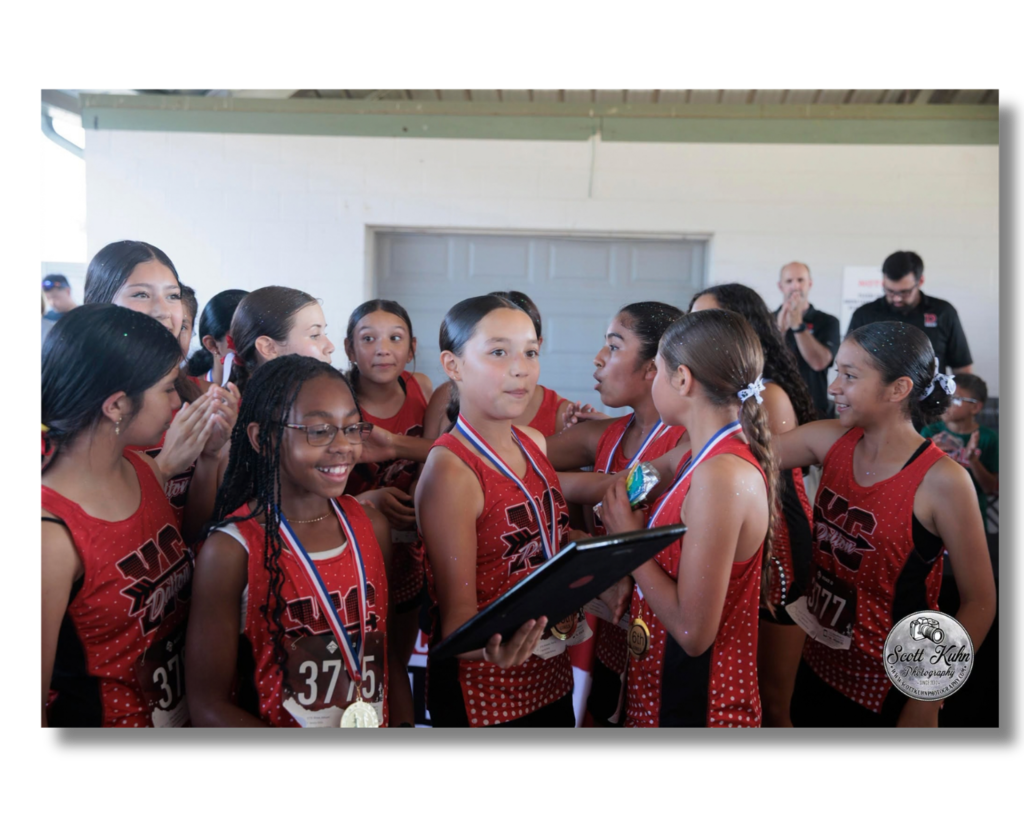 Girls celebrate their win.