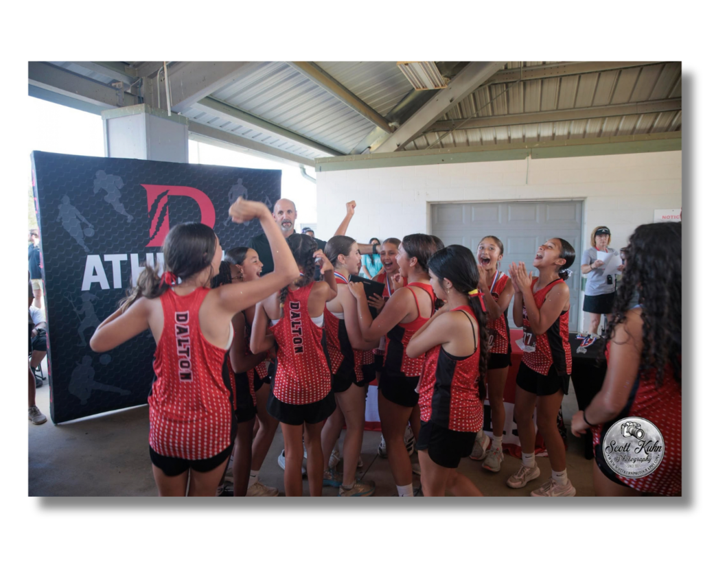 Girls celebrate their win.