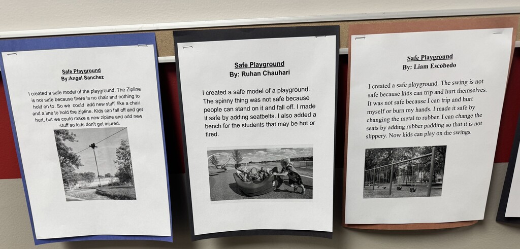 Three third-grade “Safe Playground” writing projects displayed on a bulletin board. Students explain safety concerns they identified with playground equipment and describe changes they would make to improve