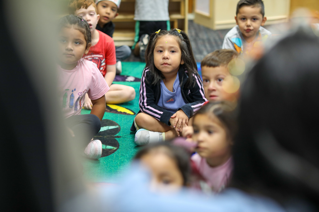 Students watch intently.