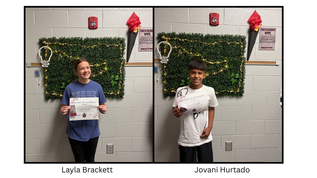 Student holds a Spartan Student of the Month certificate. The student is being recognized for demonstrating the September character trait of Hope.