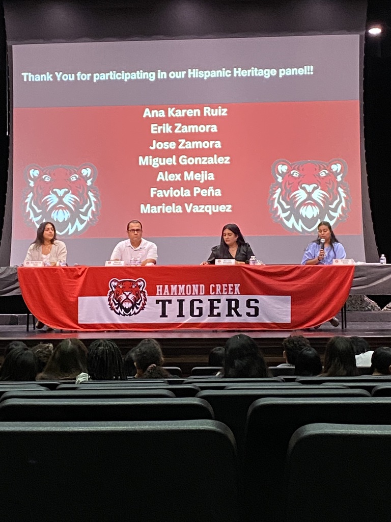 Panelists participate in a Hispanic Heritage Month discussion for HCMS students. Community members share stories, experiences, and perspectives during a presentation hosted by 6th grade social studies.