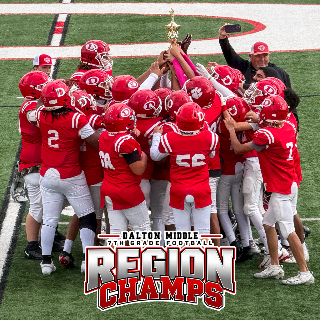Football team celebrate victory with "Region Champs" title