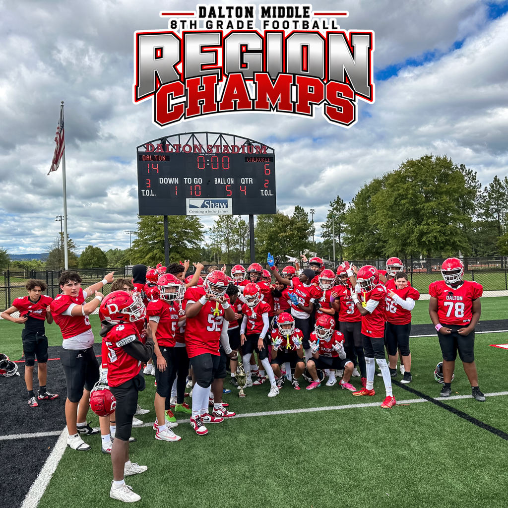 Football team celebrate victory with "Region Champs" title