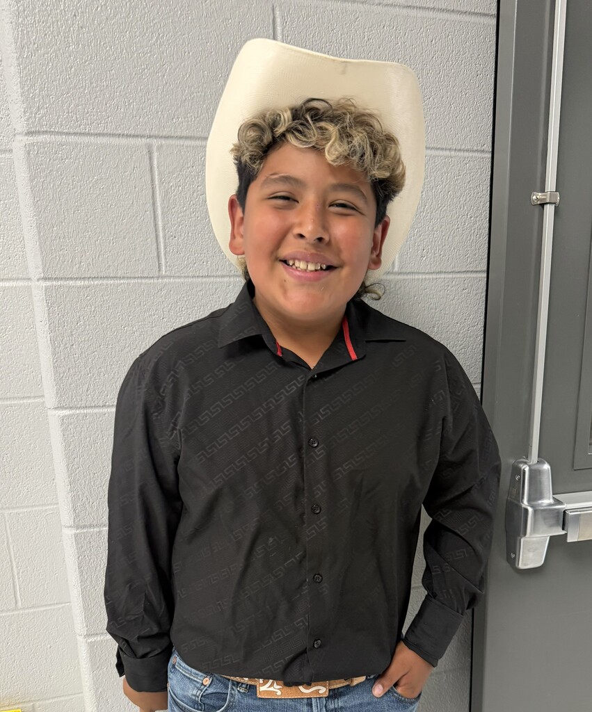 Darian Rivera poses with a big smile while celebrating his publication with Georgia Public Broadcasting's Student Voices Collective.