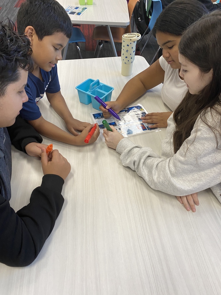 HCMS students putting cybersecurity knowledge into action through hands-on activities.