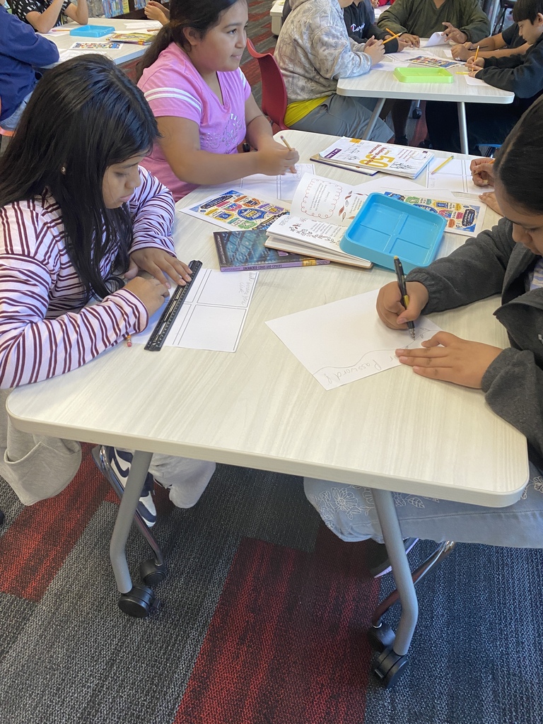 HCMS students putting cybersecurity knowledge into action through hands-on activities.