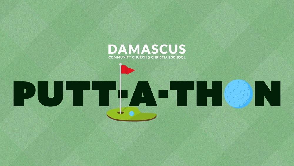 putting green with a flag and golf ball