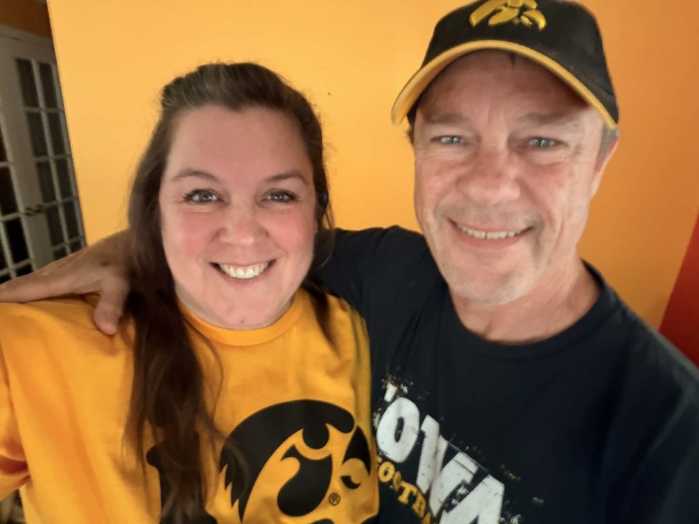 a smiling man and woman