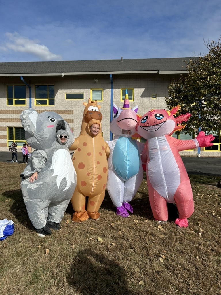 Teachers in inflatable costumes