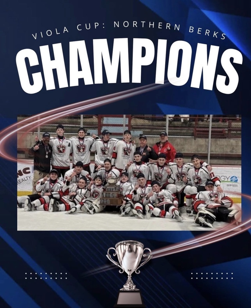 Picture of Northern Berks Scholastic Ice Hockey team on the ice with their Viola Cup Trophy
