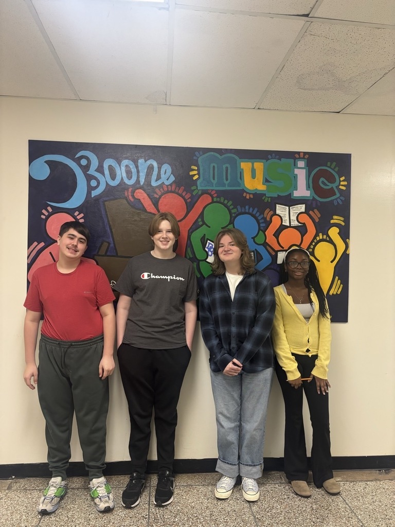 Berks Junior County Chorus participants - 9th graders standing in front of a DBoone Music mural 