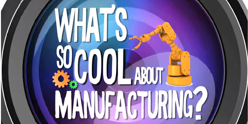 Camera lens with the words What's So Cool About Manufacturing? with a robotic machine and gears.