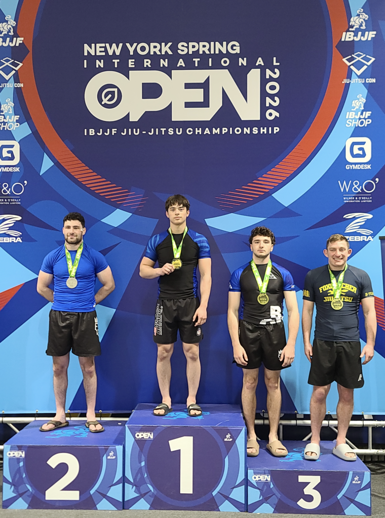 Medal podium 1-3 at the IBJJF New York Open with one first place, one second place and two who tied for third place on the podium