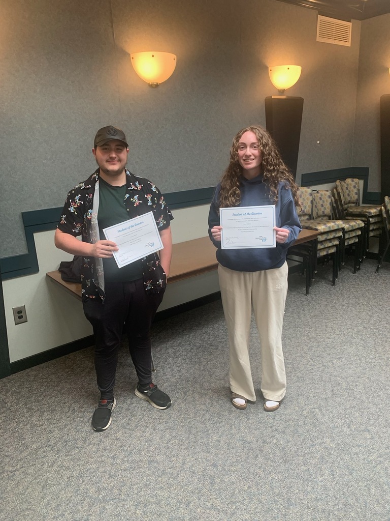 Two students holding their Student of the Quarter Certificates from BCTC
