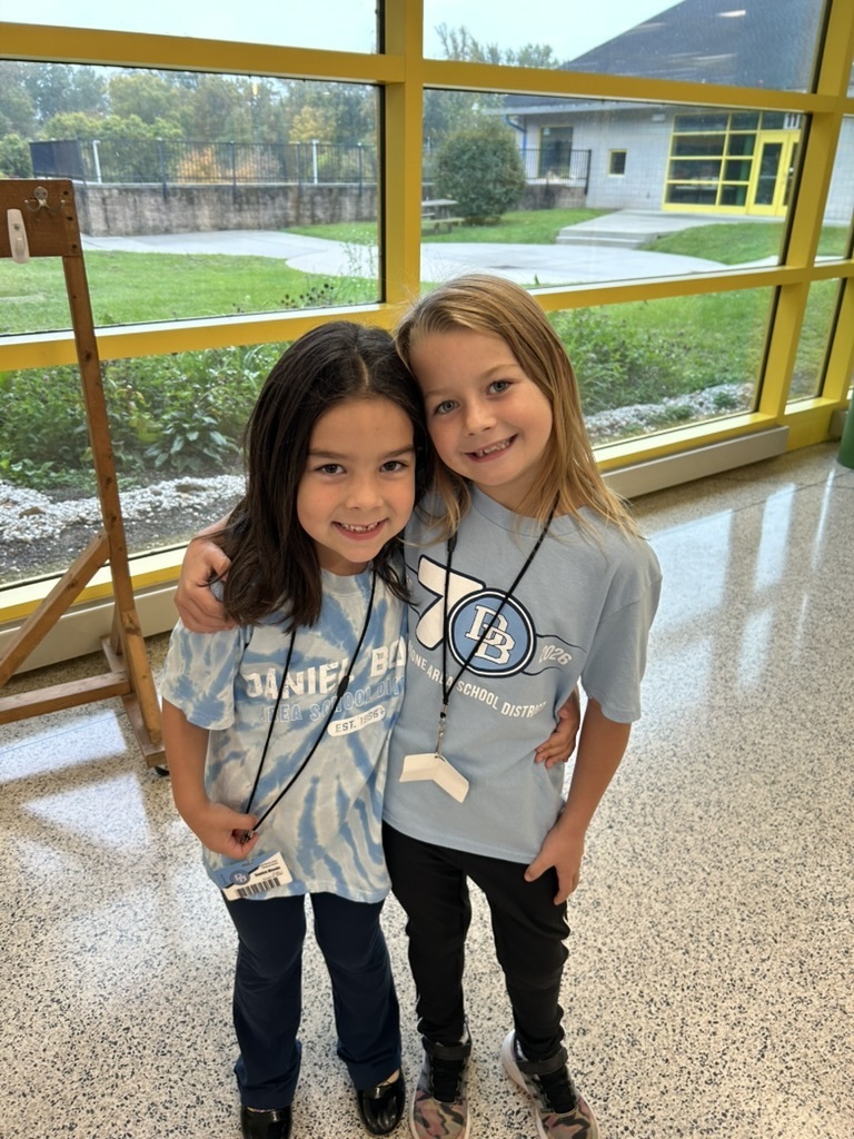 two students arm in arm wearing Boone t-shirts