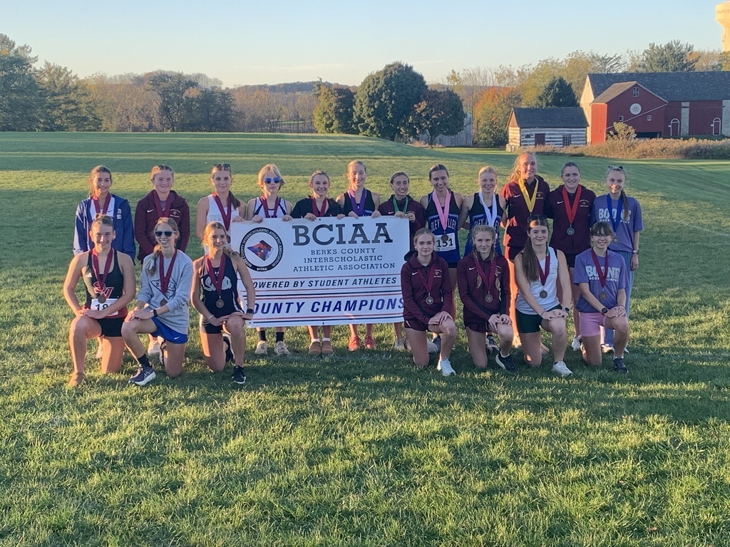 The girls track team medalist holding the BCIAA County Champions