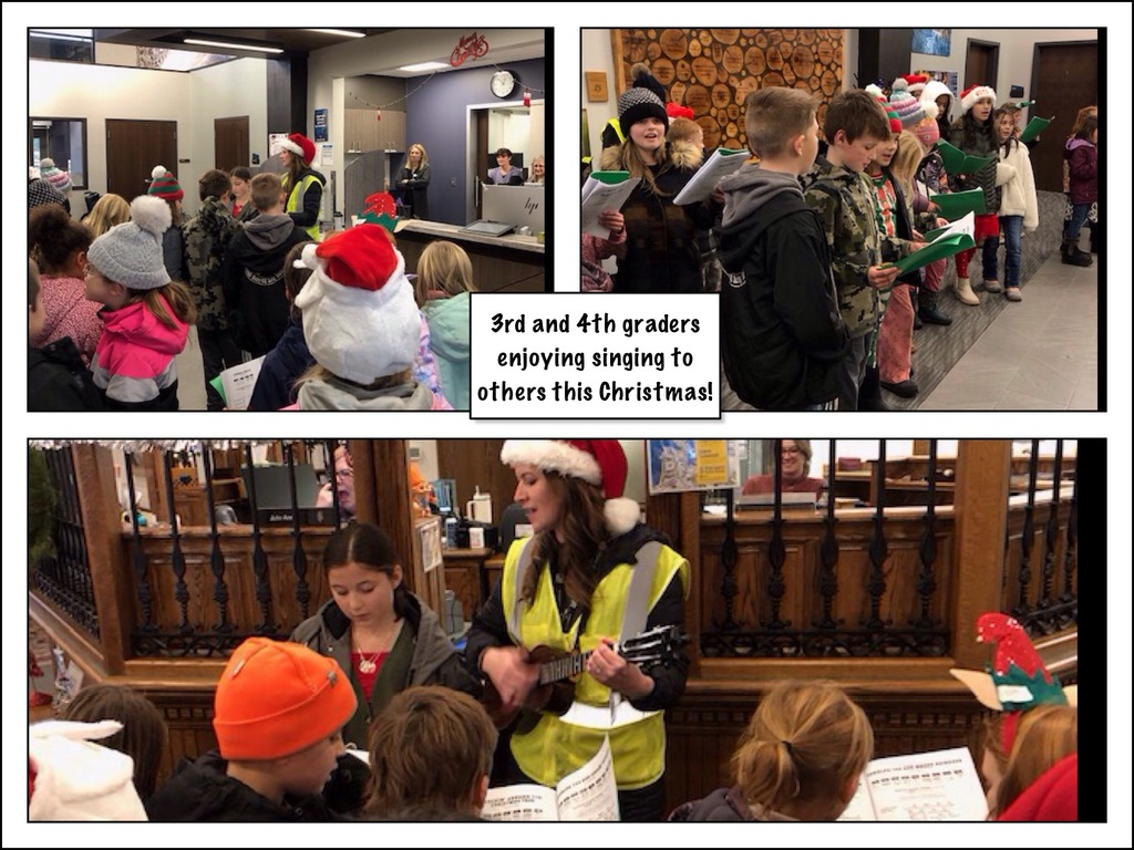 3rd and 4th Grade sing downtown.