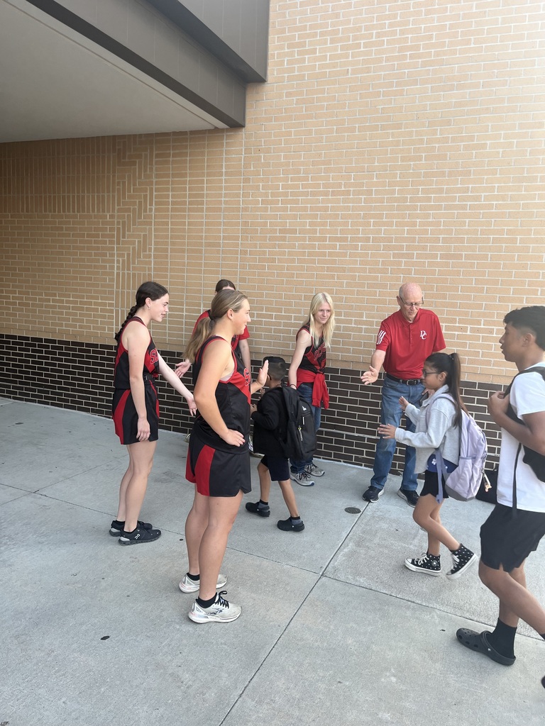 Cross Country Team greeting students