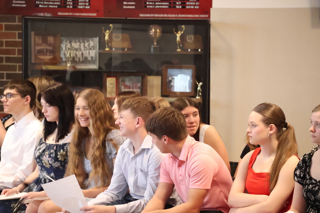 New inductees waiting in anticipation for the National Honor Society ceremony to begin.