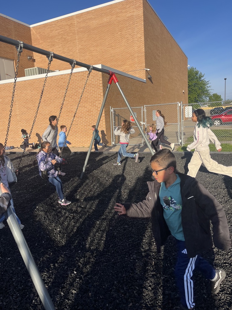 National Honor Society students enjoying morning recess with elementary students.