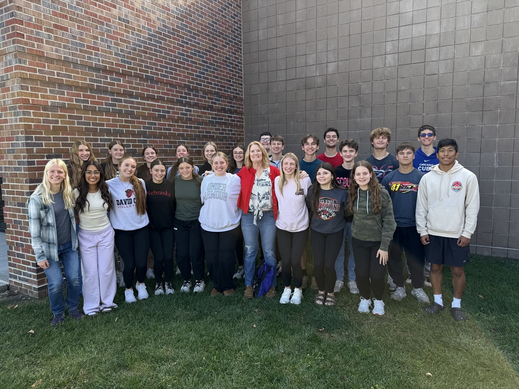 National Honor Society members presented Genesis House with a monetary donation to support their continued efforts in our community.