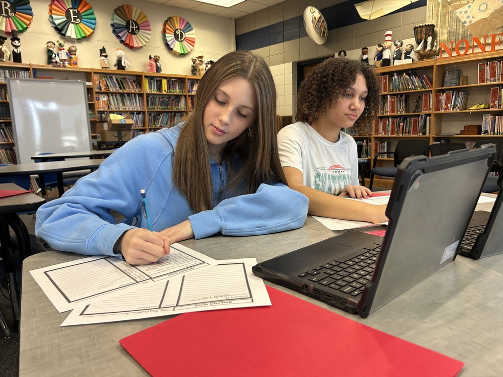 Middle School students studying in library