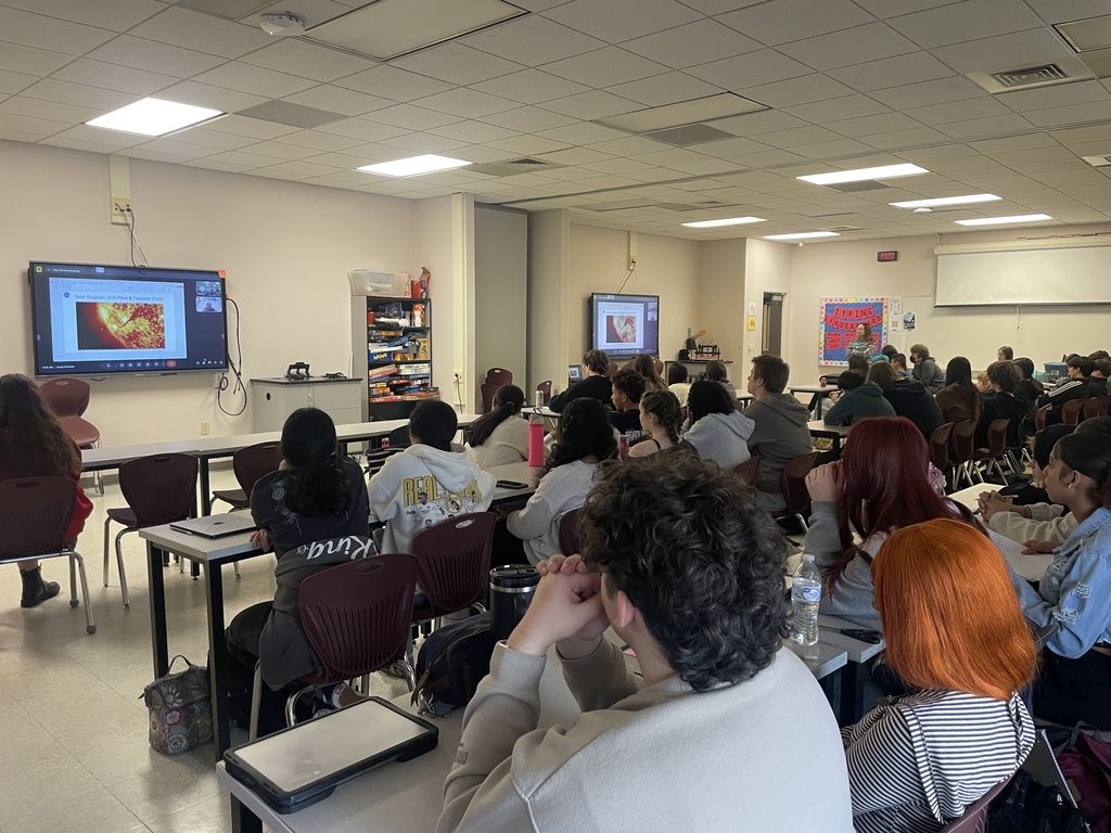 Students participating in Google Meet with astrophysicist.