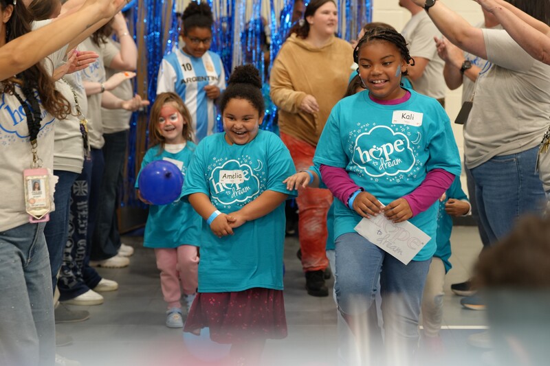 kids in blue tshirts