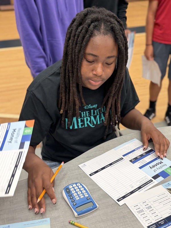 Student filling out paperwork