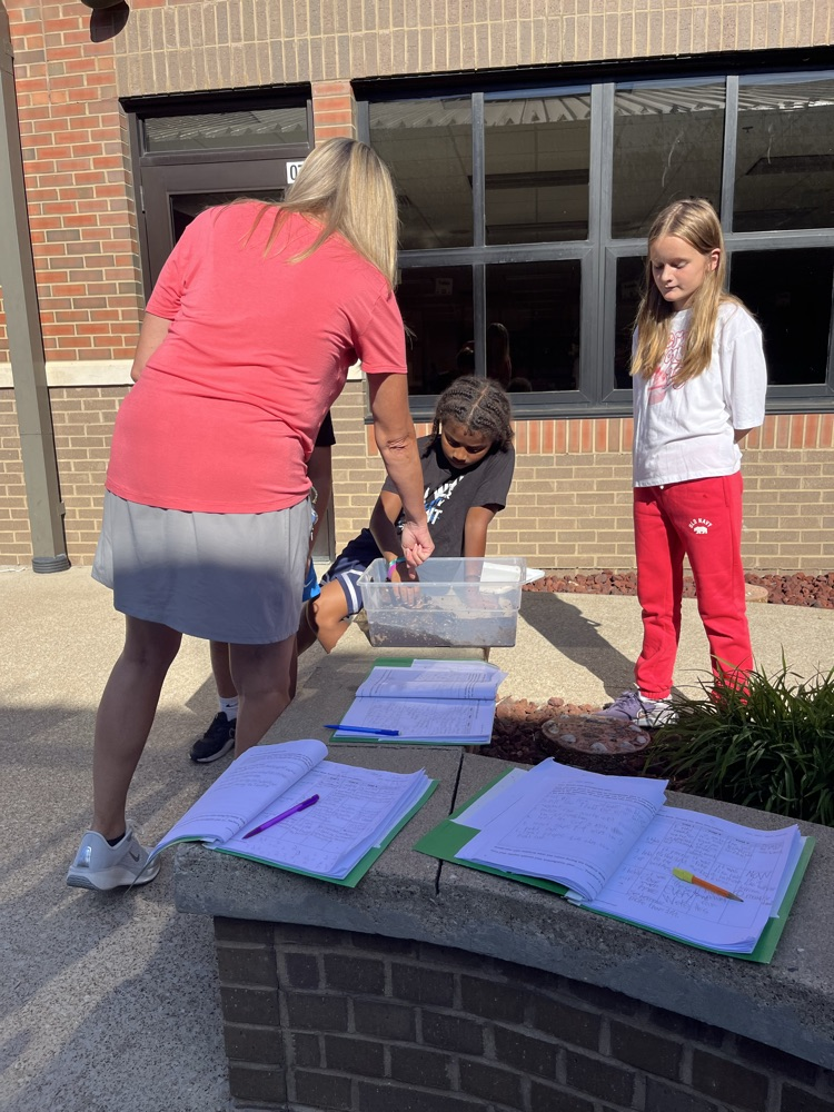 students working on science experiments