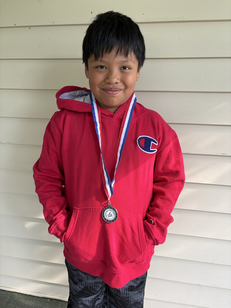 Meadow Lands student with medal