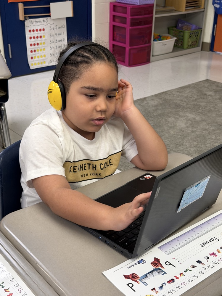 student working on computer